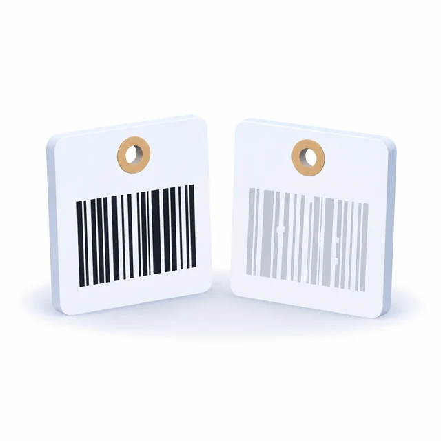 Two identical tags: the barcode crisp and black on one, pale and broken on the other